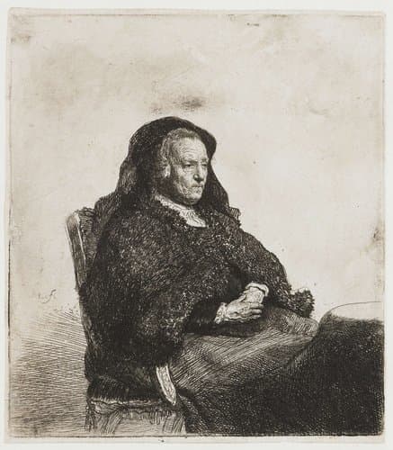 The artist's mother seated at a table by Rembrandt van Rijn