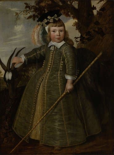 Portret van een jongetje met een bok