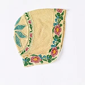 Baby's cap by Unknown