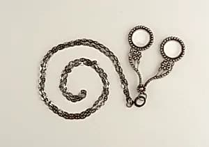 Lorgnon and chain by Unknown