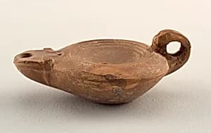 Oil lamp by Unknown