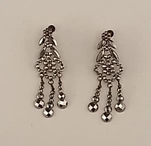 Pair of earrings by Tinsel Trading Company