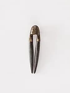 Topknot pin by Unknown