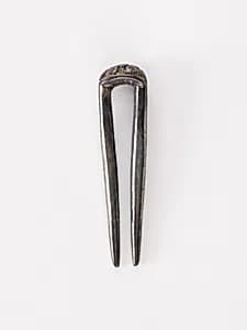 Topknot pin by Unknown