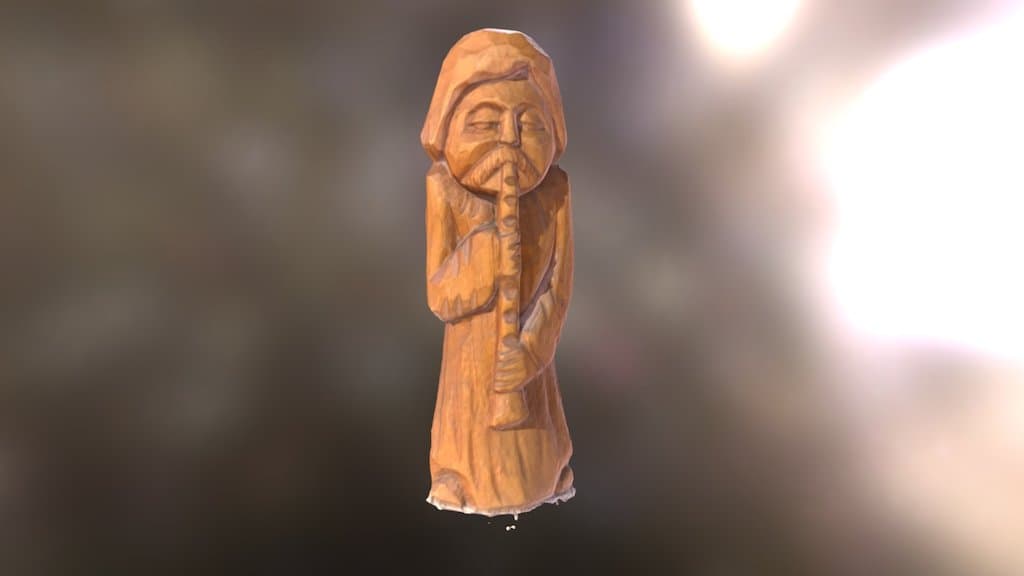 Joueur de flûte en bois.
