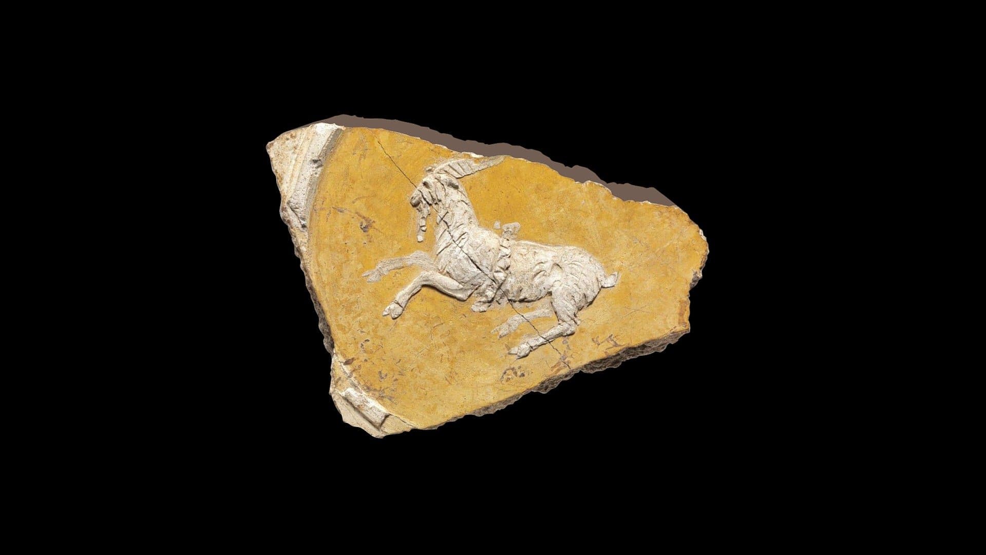 Stucco relief with goat, double-sided