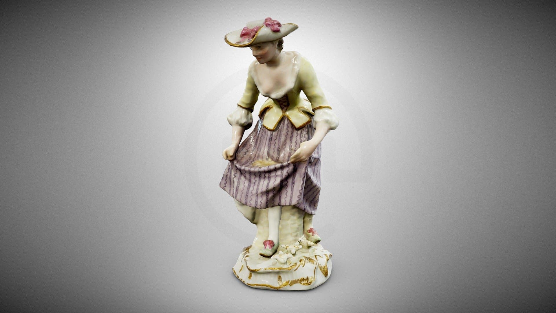 Statuette of a Woman Feeding Poultry